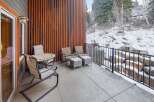Enjoy the serene beauty of this property with its inviting outdoor patio space.