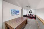 Discover this stunning property featuring a spacious loft area, perfect for relaxation or entertainment.