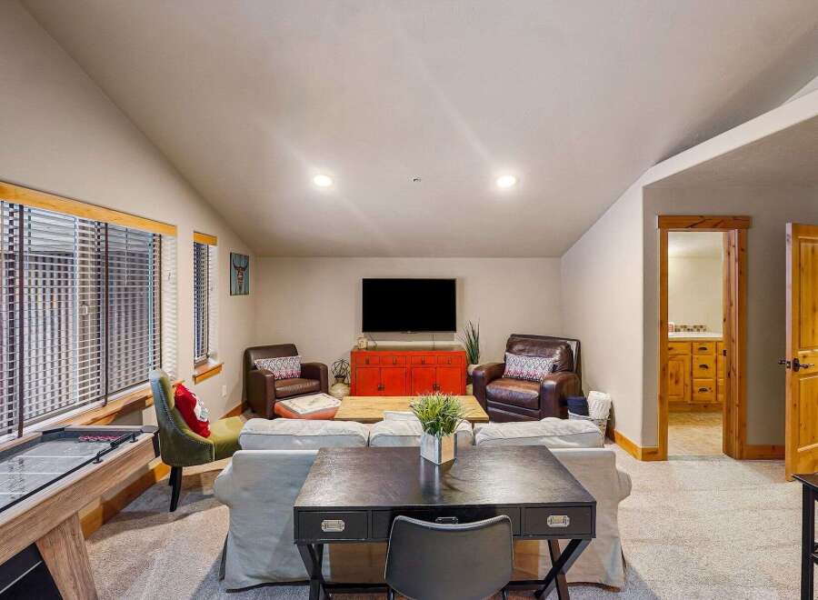 This stunning property boasts a spacious living area, perfect for entertaining or relaxing.