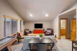 This stunning property boasts a spacious living area, perfect for entertaining or relaxing.