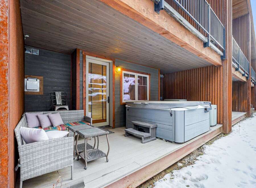 Enjoy luxurious relaxation in this stunning property featuring a private hot tub, perfect for unwinding after a day of adventure.