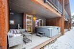 Enjoy luxurious relaxation in this stunning property featuring a private hot tub, perfect for unwinding after a day of adventure.