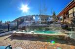 Enjoy the ultimate relaxation experience at this luxurious property, featuring a stunning outdoor hot tub.