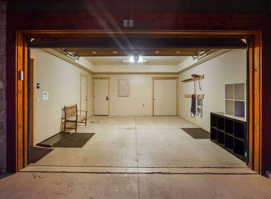 Step into this spacious garage, perfect for storing vehicles or creating a workshop.