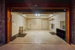 Step into this spacious garage, perfect for storing vehicles or creating a workshop.