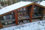 This stunning mountain home offers luxurious living with breathtaking views.