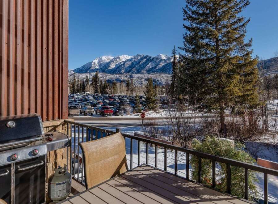 Enjoy breathtaking mountain views from this stunning property! This home features a spacious deck, perfect for relaxing and taking in the scenery.