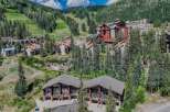 Experience luxury mountain living in this stunning property nestled amidst a picturesque ski resort.