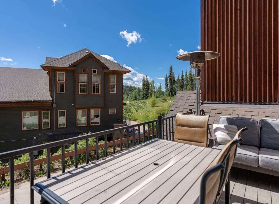Enjoy breathtaking mountain views from this spacious balcony, perfect for outdoor dining and relaxation.
