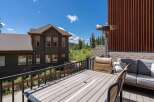 Enjoy breathtaking mountain views from this spacious balcony, perfect for outdoor dining and relaxation.