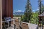 Enjoy breathtaking mountain views from this stunning balcony, complete with a premium grill for outdoor cooking.
