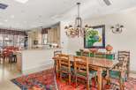 This stunning dining room showcases a beautiful blend of rustic charm and modern elegance.