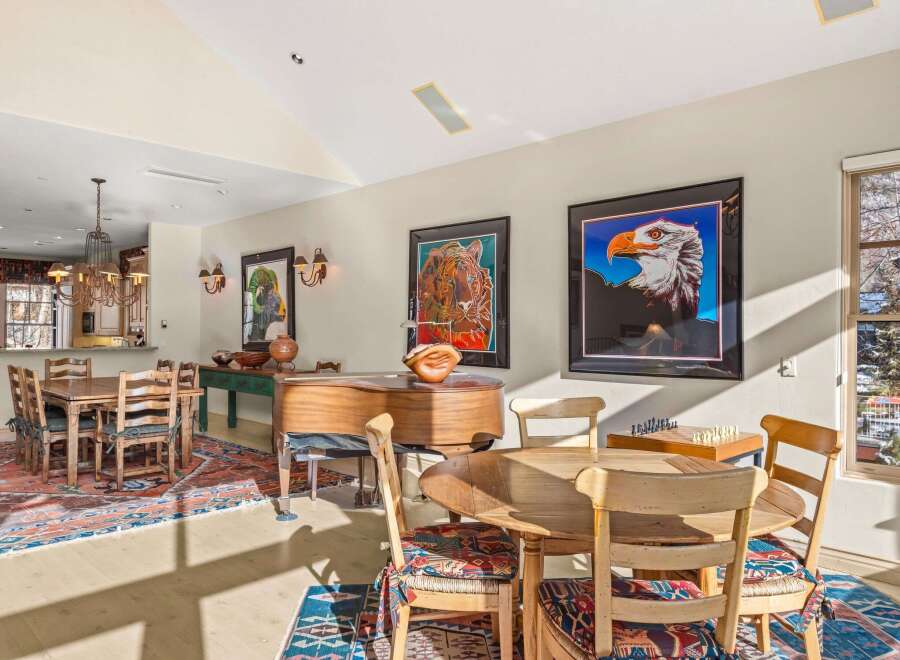 This stunning property boasts a spacious dining area, perfect for entertaining guests.
