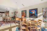 This stunning property boasts a spacious dining area, perfect for entertaining guests.