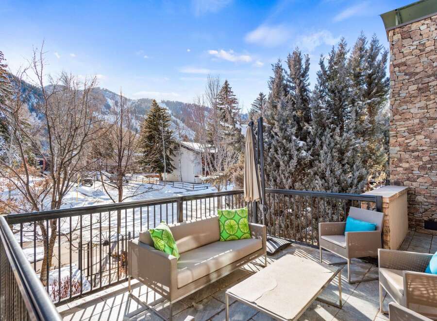 Enjoy breathtaking mountain views from this stunning outdoor space.