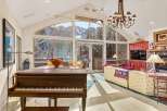 This stunning property boasts a grand piano, perfect for entertaining guests or enjoying a relaxing evening.