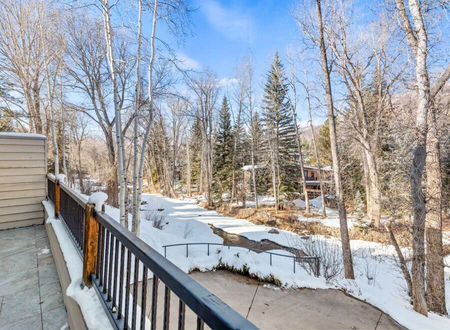 Enjoy stunning views of the winter landscape from this beautiful property.