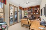 This stunning home office boasts a warm and inviting atmosphere, perfect for productivity and focus.