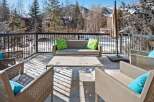 Enjoy breathtaking mountain views from this luxurious outdoor patio.