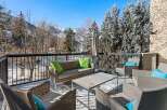 Enjoy breathtaking mountain views from this luxurious outdoor patio.