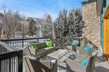 Enjoy breathtaking mountain views from this luxurious outdoor patio.