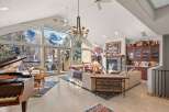 Experience luxury living in this stunning property, featuring breathtaking mountain views through expansive windows.