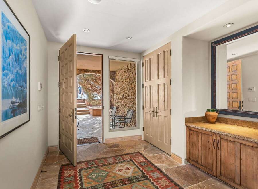 Step into luxury with this stunning property, featuring an inviting entryway that sets the tone for the entire home.