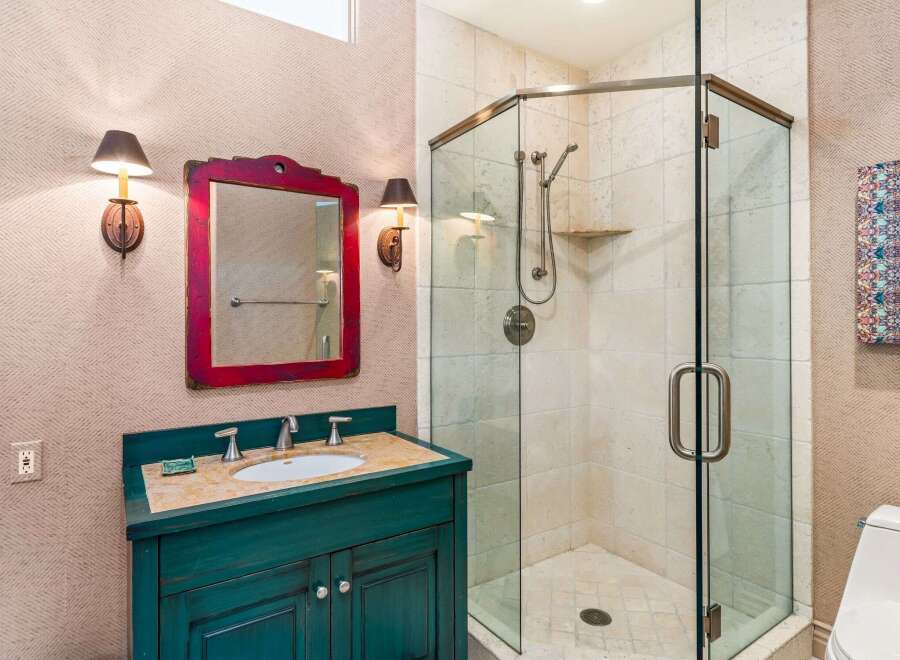 This stunning bathroom boasts a unique blend of style and functionality.