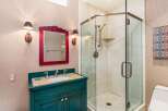 This stunning bathroom boasts a unique blend of style and functionality.