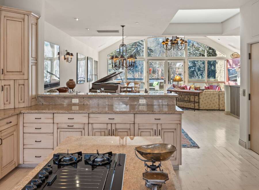 Experience luxury living in this stunning property, featuring a gourmet kitchen with top-of-the-line appliances and ample counter space.