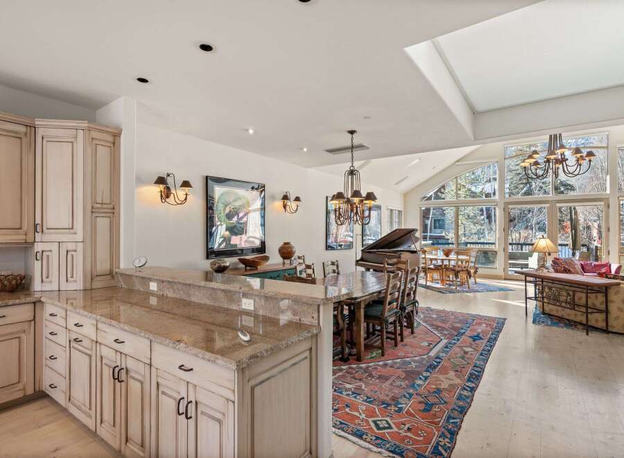 Experience luxury living in this stunning property featuring a gourmet kitchen with custom cabinetry and granite countertops.