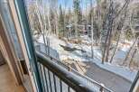 Enjoy breathtaking views from this stunning property! This home offers a serene setting with a beautiful stream and lush trees.