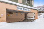 The Snow Ghost Inn, nestled in a snowy landscape, offers a cozy retreat.