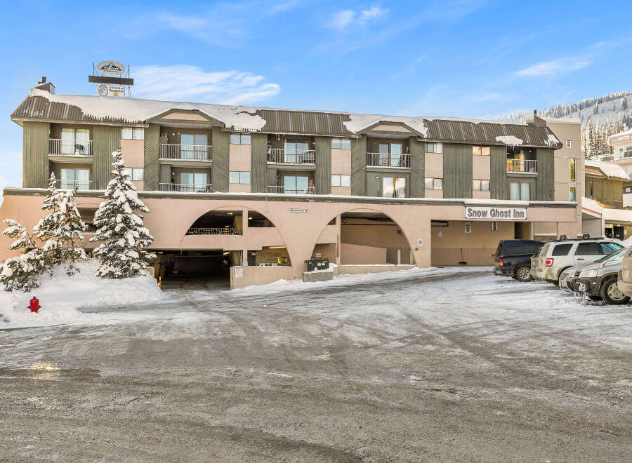 Discover the charm of Snow Ghost Inn, a welcoming property nestled in a snowy landscape.