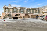 Discover the charm of Snow Ghost Inn, a welcoming property nestled in a snowy landscape.