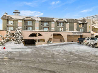 Discover the charm of Snow Ghost Inn, a welcoming property nestled in a snowy landscape.