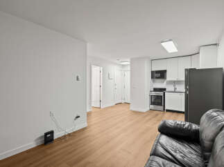 Discover modern living in this stylish apartment! This property boasts a bright and airy open-concept layout, perfect for entertaining.