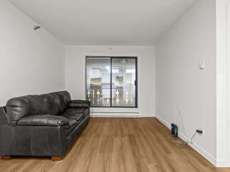 Discover this inviting living space, perfect for relaxation and entertaining.