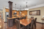 This stunning property boasts a spacious kitchen and dining area, perfect for entertaining.