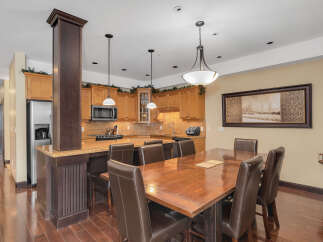 This stunning property boasts a spacious kitchen and dining area, perfect for entertaining.