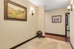 Step into this inviting entryway, showcasing a blend of elegance and warmth.