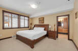 This stunning bedroom boasts a cozy and inviting atmosphere, perfect for relaxation.