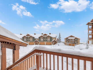 Experience the charm of mountain living in this stunning property.