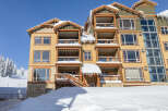 This stunning property boasts a prime location with breathtaking mountain views, perfect for a winter getaway.