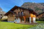 Discover the charm of this stunning property, boasting a beautiful wooden exterior and a modern design.