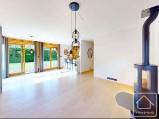 This stunning property boasts a bright and airy living space, perfect for modern living.