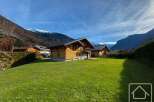 Discover your dream alpine retreat! This stunning property boasts charming wooden chalets, perfect for a cozy mountain escape.