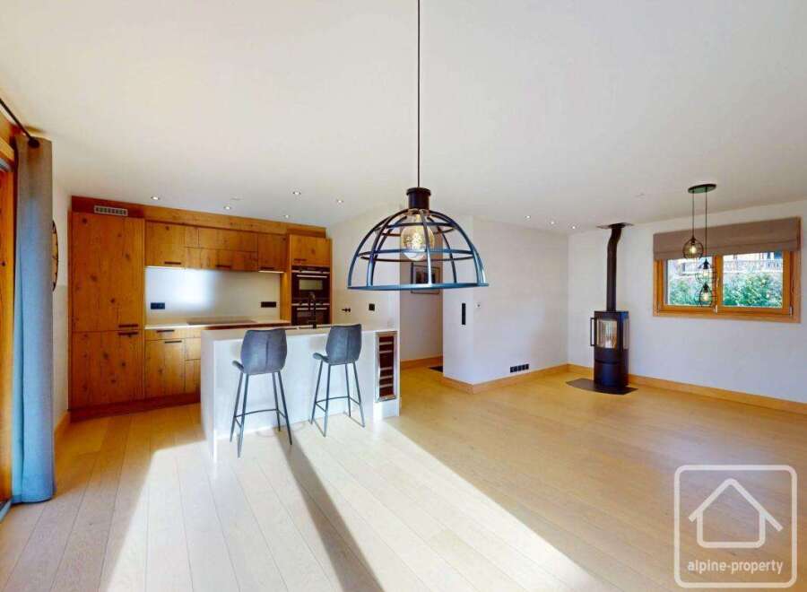 Experience modern living in this stunning property, featuring a beautifully designed kitchen with sleek countertops and ample storage.