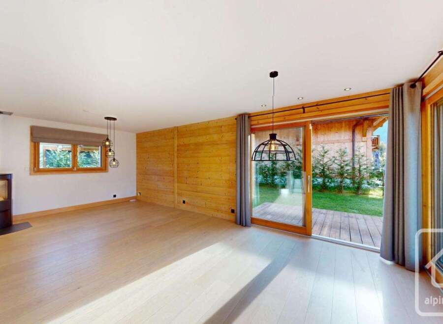 Discover the epitome of modern living in this stunning property, featuring a spacious interior with a cozy fireplace.