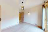 Discover the charm of this inviting property, featuring a bright and airy interior with beautiful wooden accents.